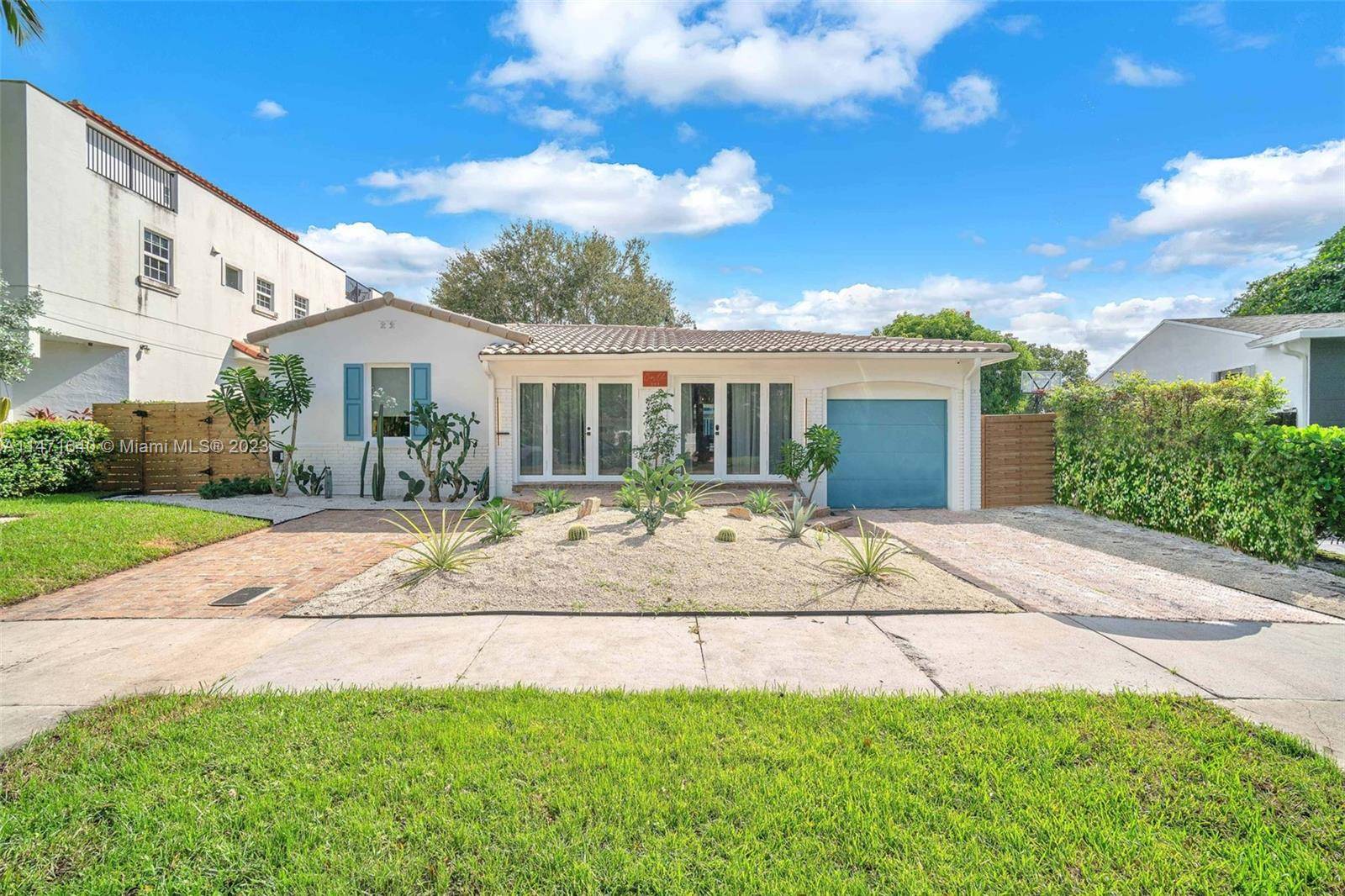 Indulge in waterfront serenity with this modern, completely renovated home on Tarpon River.