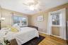 Bedroom with light wood-type flooring and ceiling fan