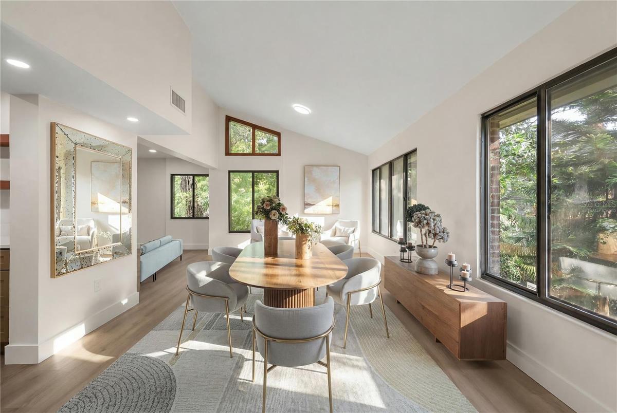 virtually staged dining room and sitting area