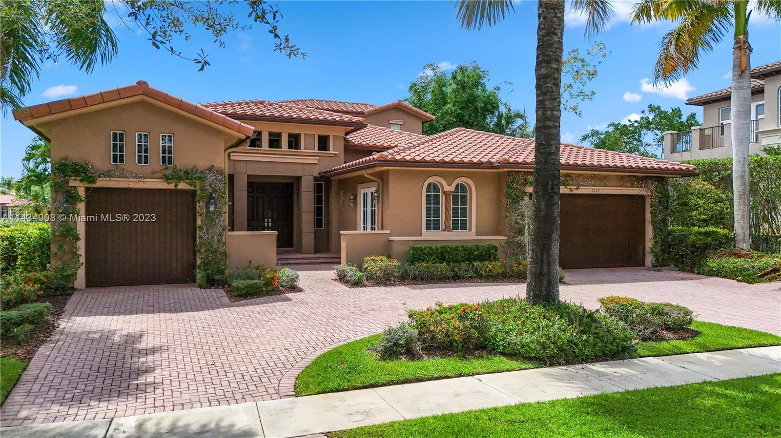 Welcome home to your exquisite oasis nested in the prestigious gated community of Heron Bay in Parkland.