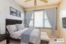 Bedroom with ceiling fan and light tile patterned floors