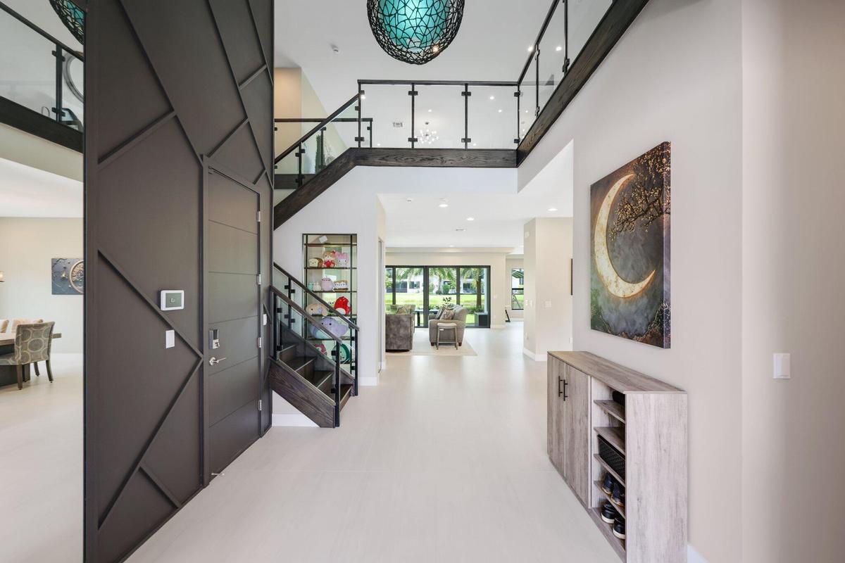 Grand Foyer Custom Feature Wall Design and Floor to Ceiling Mirror