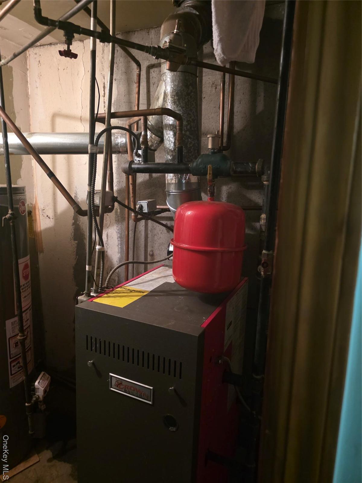 Utilities featuring a heating unit and water heater