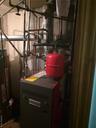Utilities featuring a heating unit and water heater