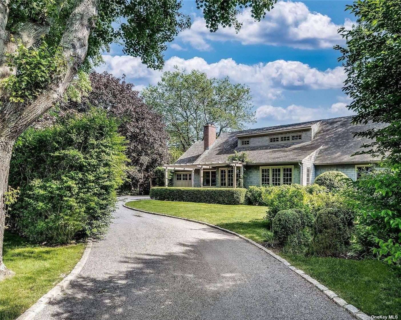 Live in the Village, be a moment to the ocean and Main Street, yet find tranquility and privacy from this custom home found on one of East Hampton's most desirable ...