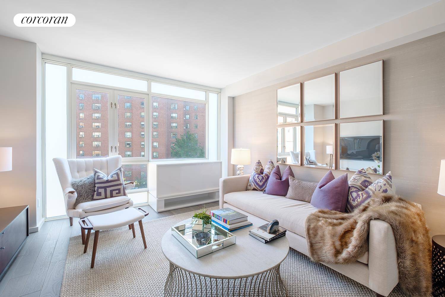 Residence 8F is a graciously proportioned east facing apartment with views to the East River through oversized windows and a sunlit living room.