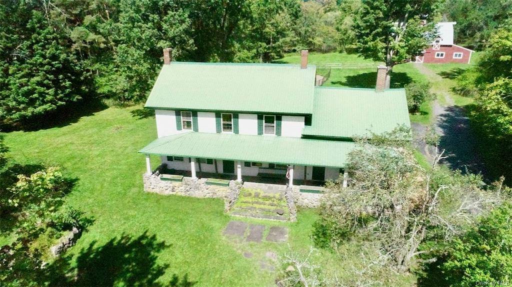 Fabulous 16 acre Farmhouse property located right off exit 106.