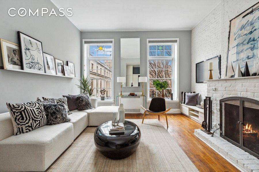 Fall in love with this charming and cozy two bedroom home on a quintessential Brooklyn Heights block !