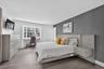 Exceptionally large Private Primary Suite with an inviting east-facing bay window! (The bed in the picture is a king-size bed).