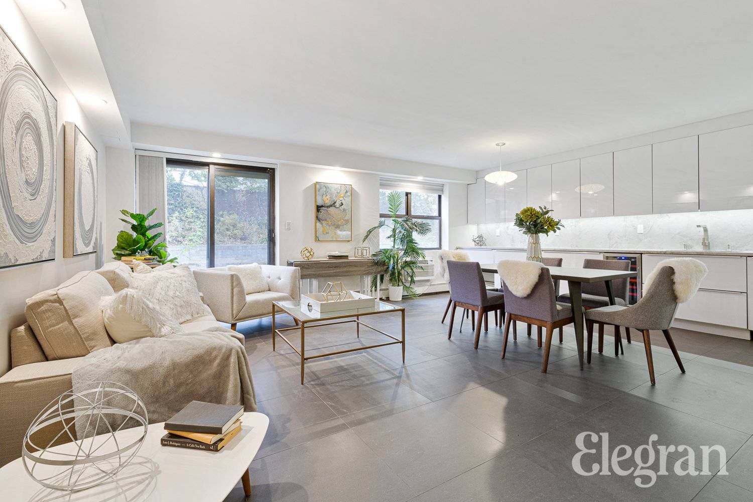 This spacious two bedroom, two bathroom apartment in Fort Greene has been beautifully renovated to create an elegant, modern space with a bright and airy atmosphere.