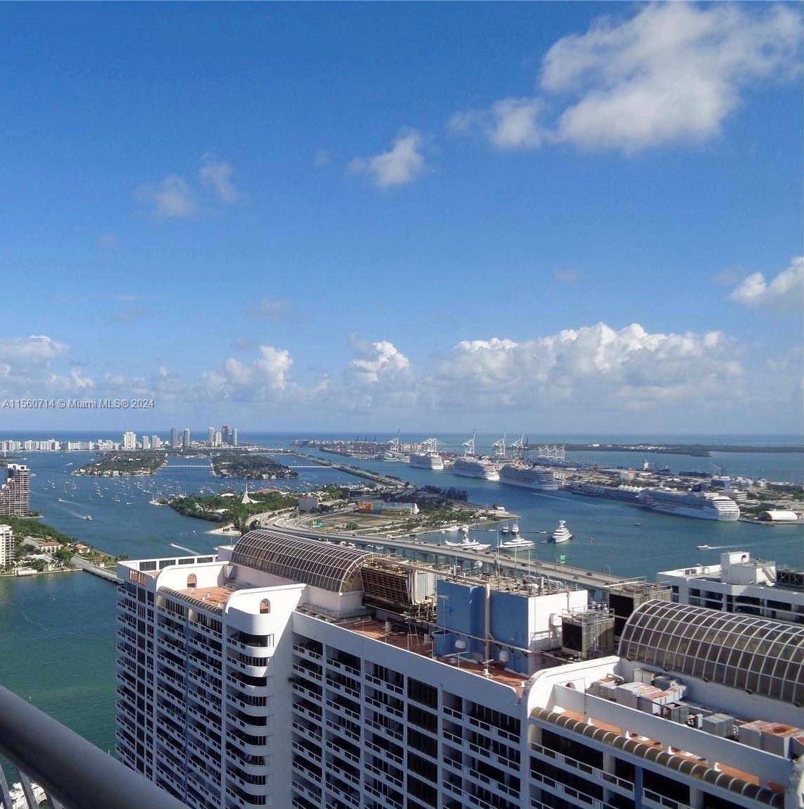 Stunning high floor condo unit available in Opera Towers, boasting breathtaking views of the ocean, Intracoastal, and city skyline.