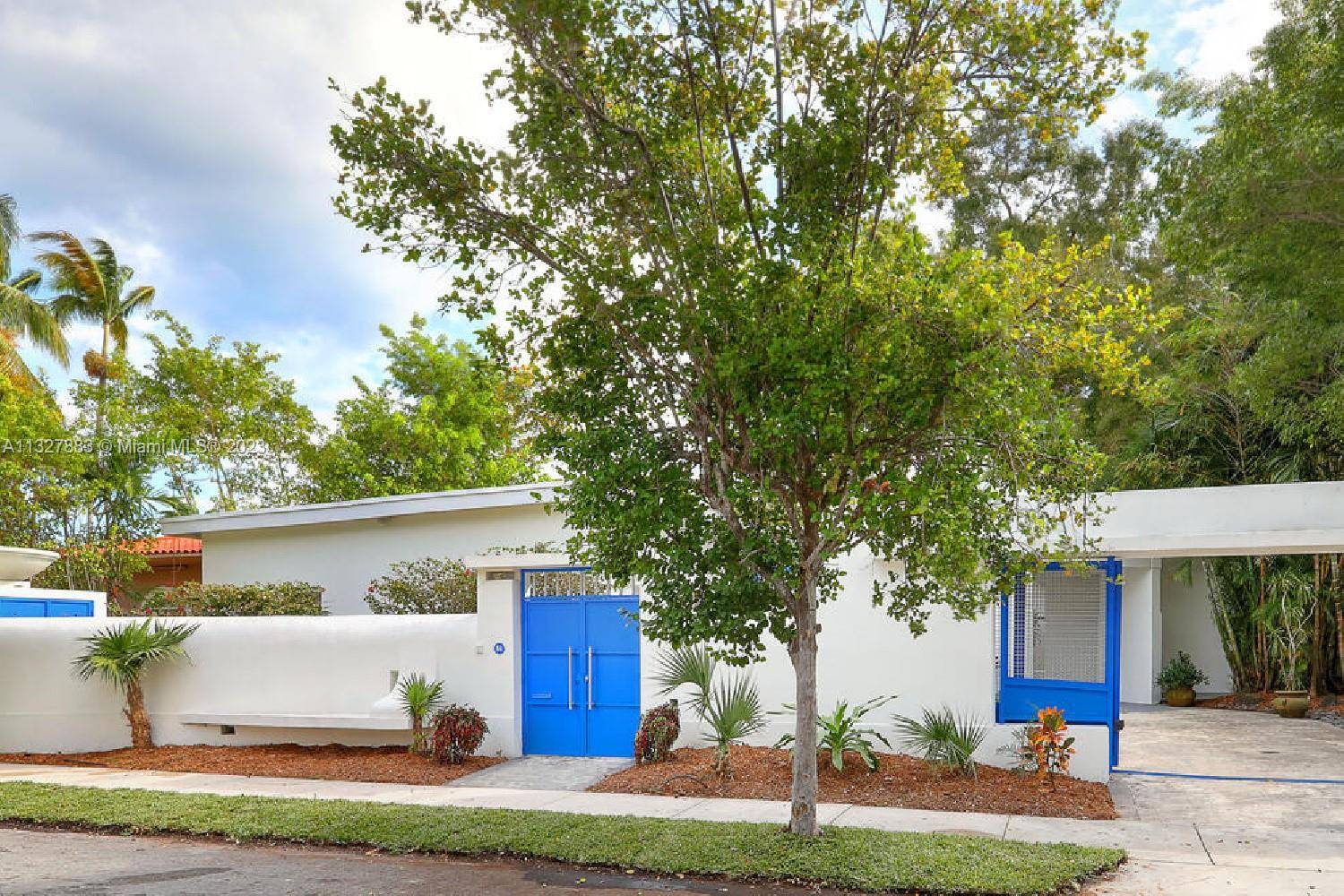 Ultra private, walled gated Miami Modern style home in the exclusive Bay Heights neighborhood of Coconut Grove.