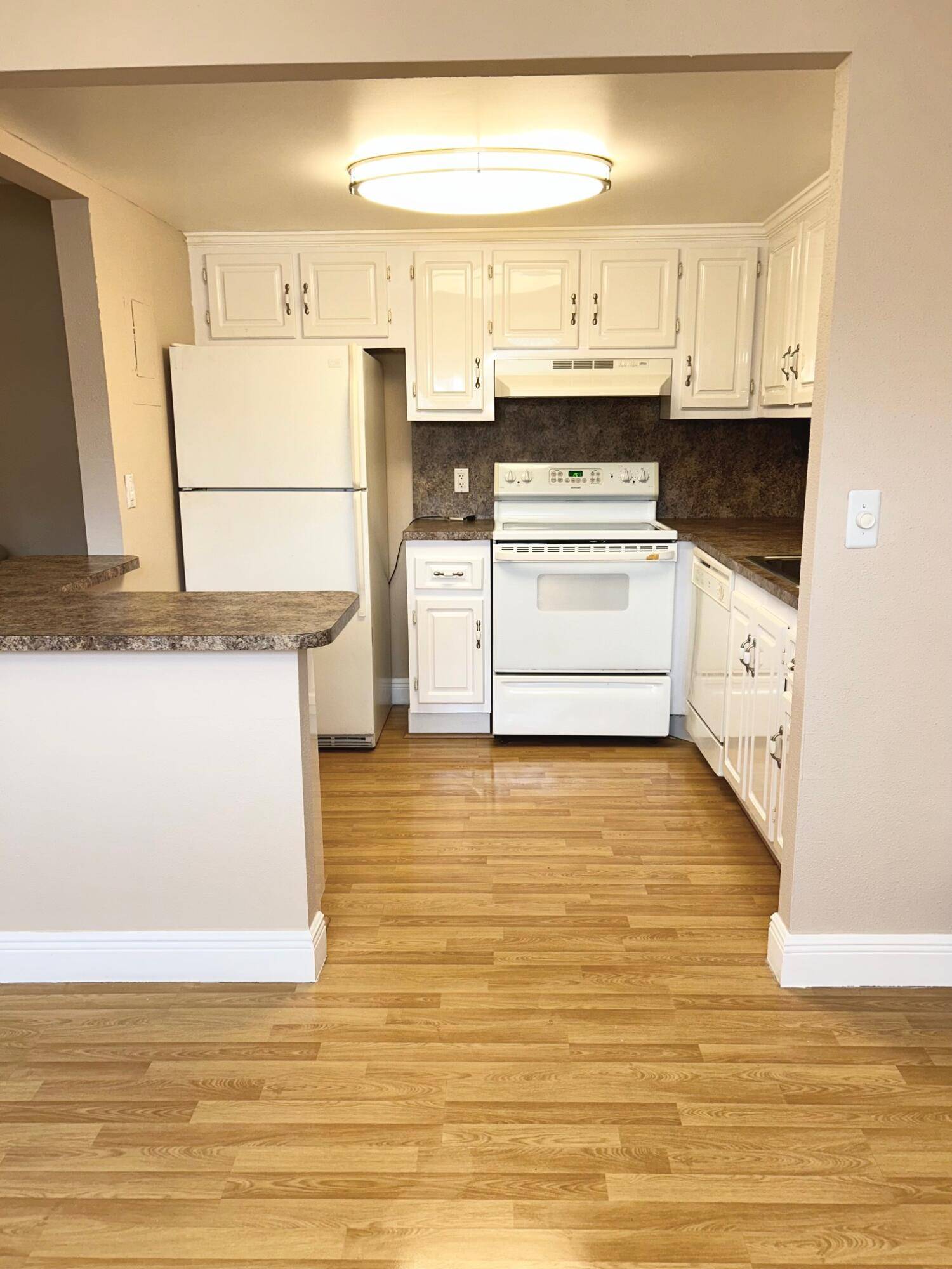 One bedroom, 1 1 2 bath with walk in shower and updated kitchen and baths !