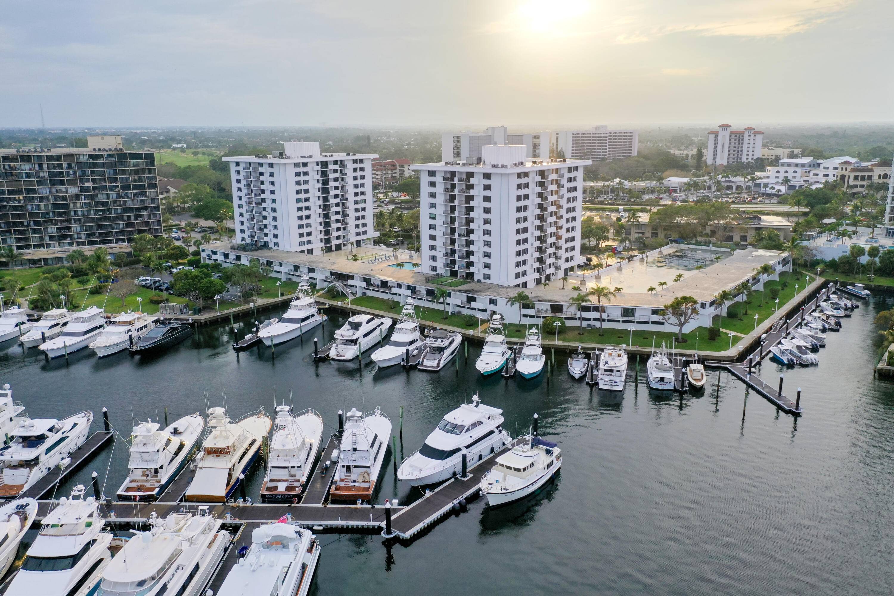 PRIME LOCATION Stunning sunrise and sunset views of the marina, inlet, and ocean right from the balcony of this 2 BR 2.