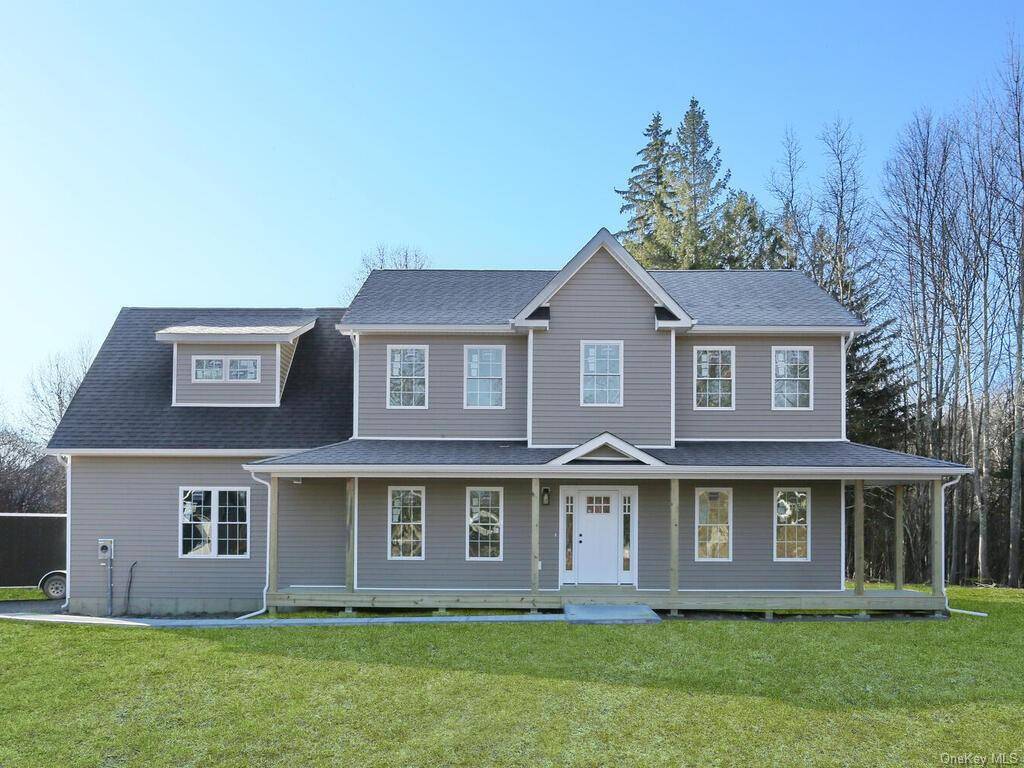 A move in ready, colonial nestled on a flat lot, part of a new, private 3 lot subdivision.