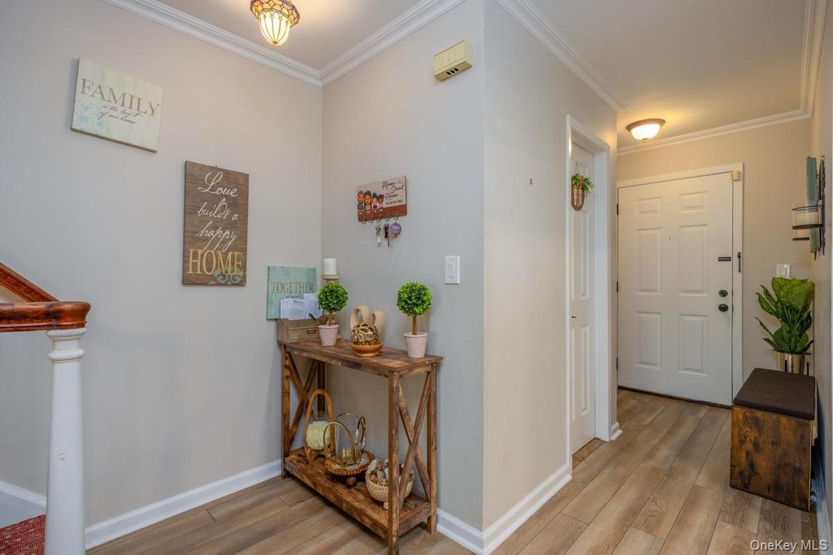 Entrance with Lavatory to the left an kitchen to the right.