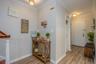 Entrance with Lavatory to the left an kitchen to the right.