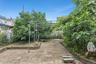 Fenced backyard featuring a patio