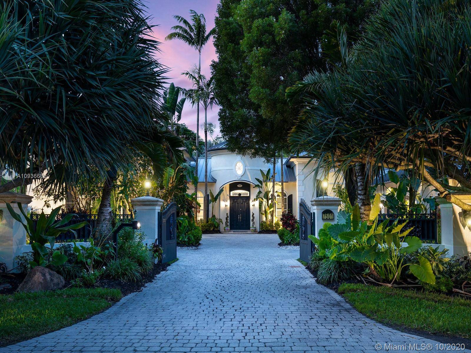 Luxurious Spanish Style Estate located in sought after N Pinecrest.