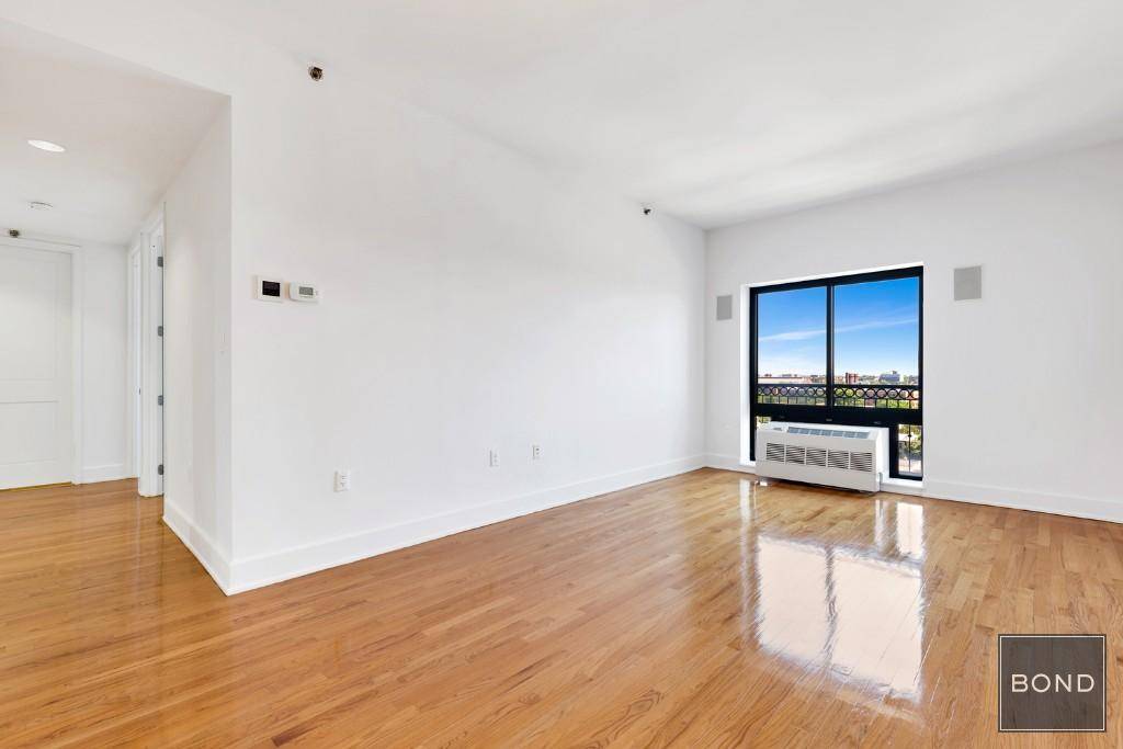 Enjoy open skies and stunning panoramic views of Brooklyn in this beautiful, well apportioned 2 bed, 2 bath home with newly refinished oak floors and oversized windows in The Shelton.