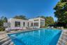 View of swimming pool featuring an outdoor living space, area for grilling, and a patio area
