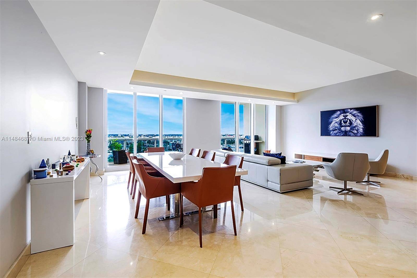 Discover the epitome of luxury living in this exceptional penthouse, offering 10 ft ceilings, impact windows, stunning city bay views from oversized terraces.