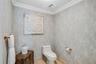 Expansive master bathroom with two separate toilets.