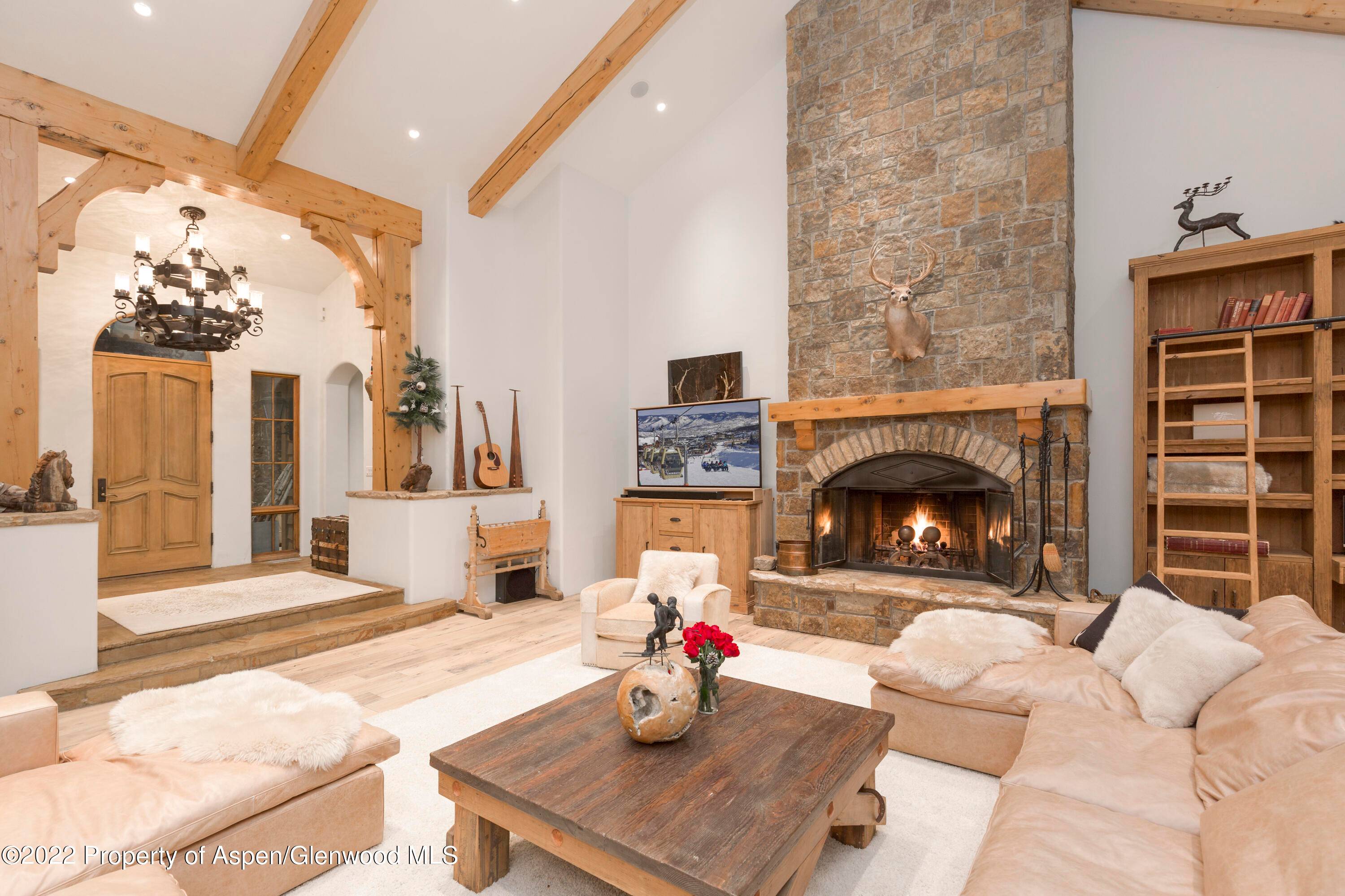 This 6 bedroom ski in, ski out home is privately nestled into the Aspen Groves with views of the ski trail, open space, and surrounding mountain range.