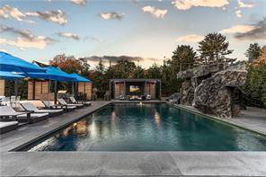 Welcome to 16 Weston Rd, a luxurious and private property in Westport, CT.