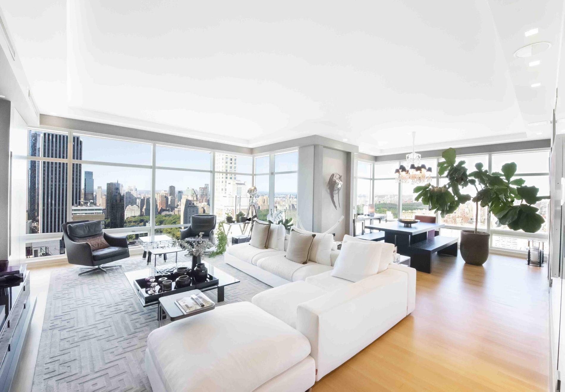 Embrace the allure of Central Park from this generously spacious apartment, boasting floor to ceiling windows that frame an enchanting skyline panorama.
