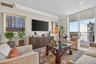 Marble flooring, ocean views, floor to ceiling glass, crown molding. Bright open and airy.