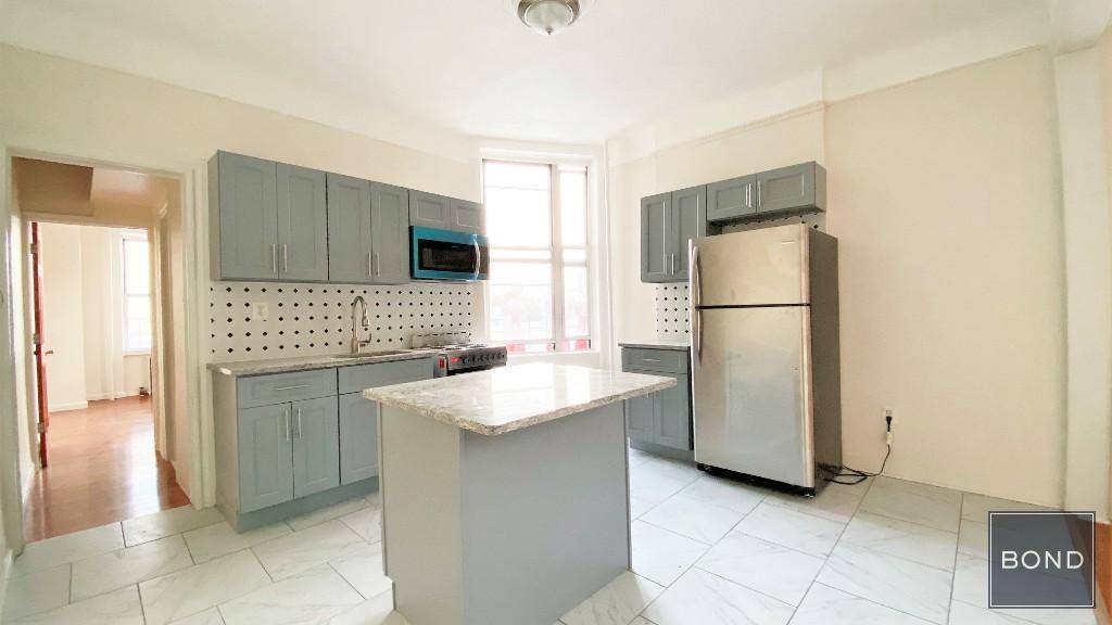 Humongous renovated 2 bed Flex 3 bed apartment with an open kitchen and an extra room that's perfect for a third bedroom, home office, or game room.