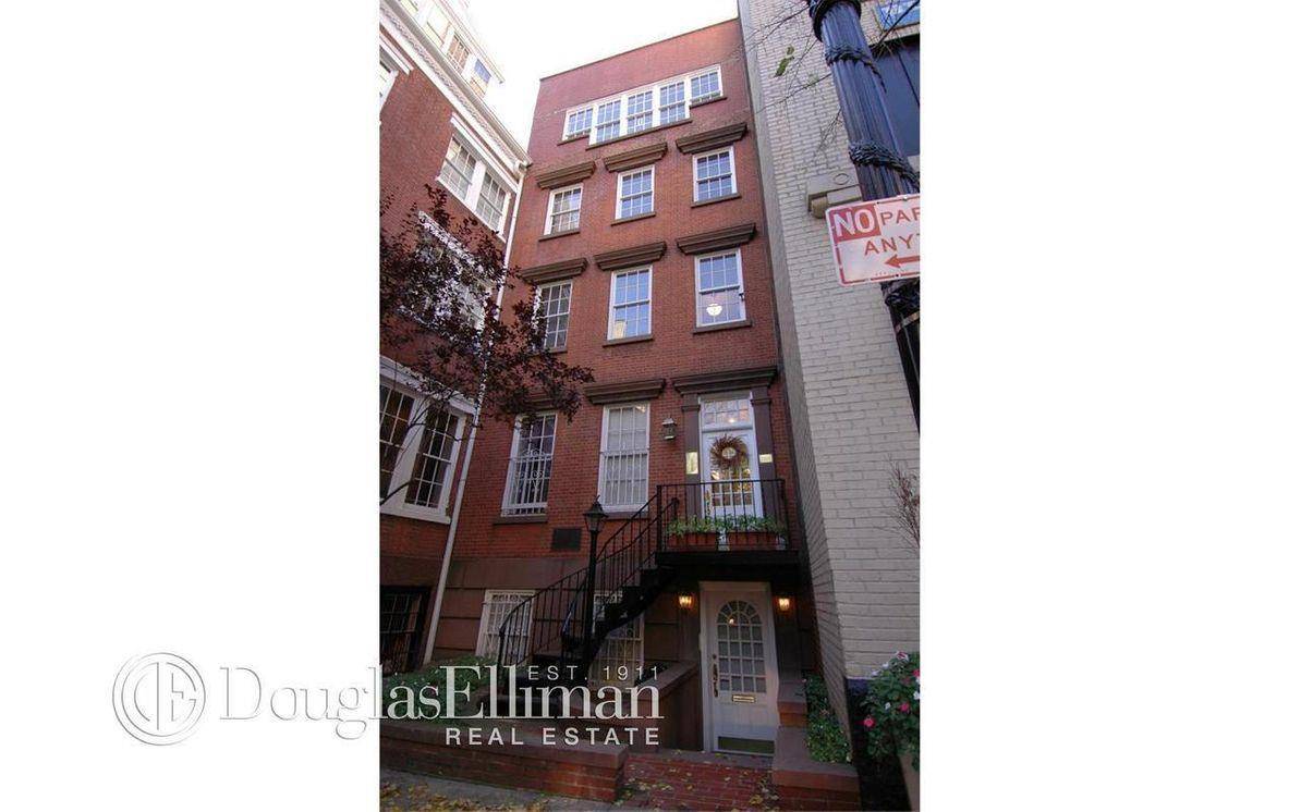 This 3 story triplex sits in the curve of the most beautiful village street in New York.
