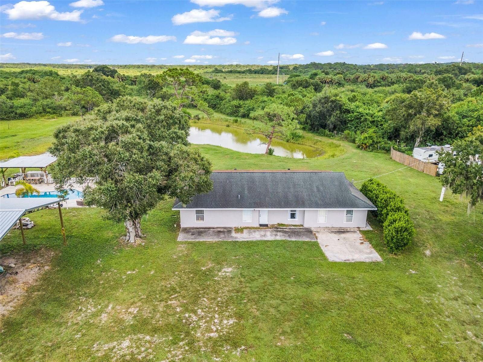 Exquisite 10 acre renovated ranch with 5 beds and 3 baths 2 in the house 1 in pool area.