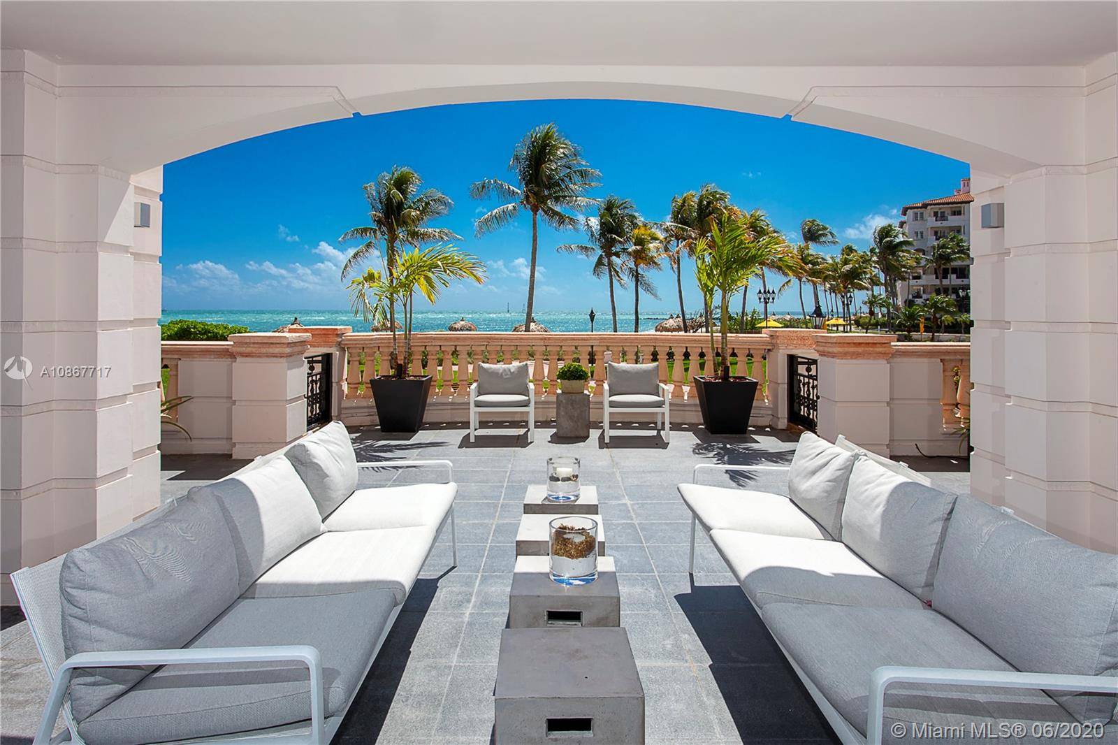 This stunning ground floor Oceanside unit on Fisher Island redefines luxury living at its finest.