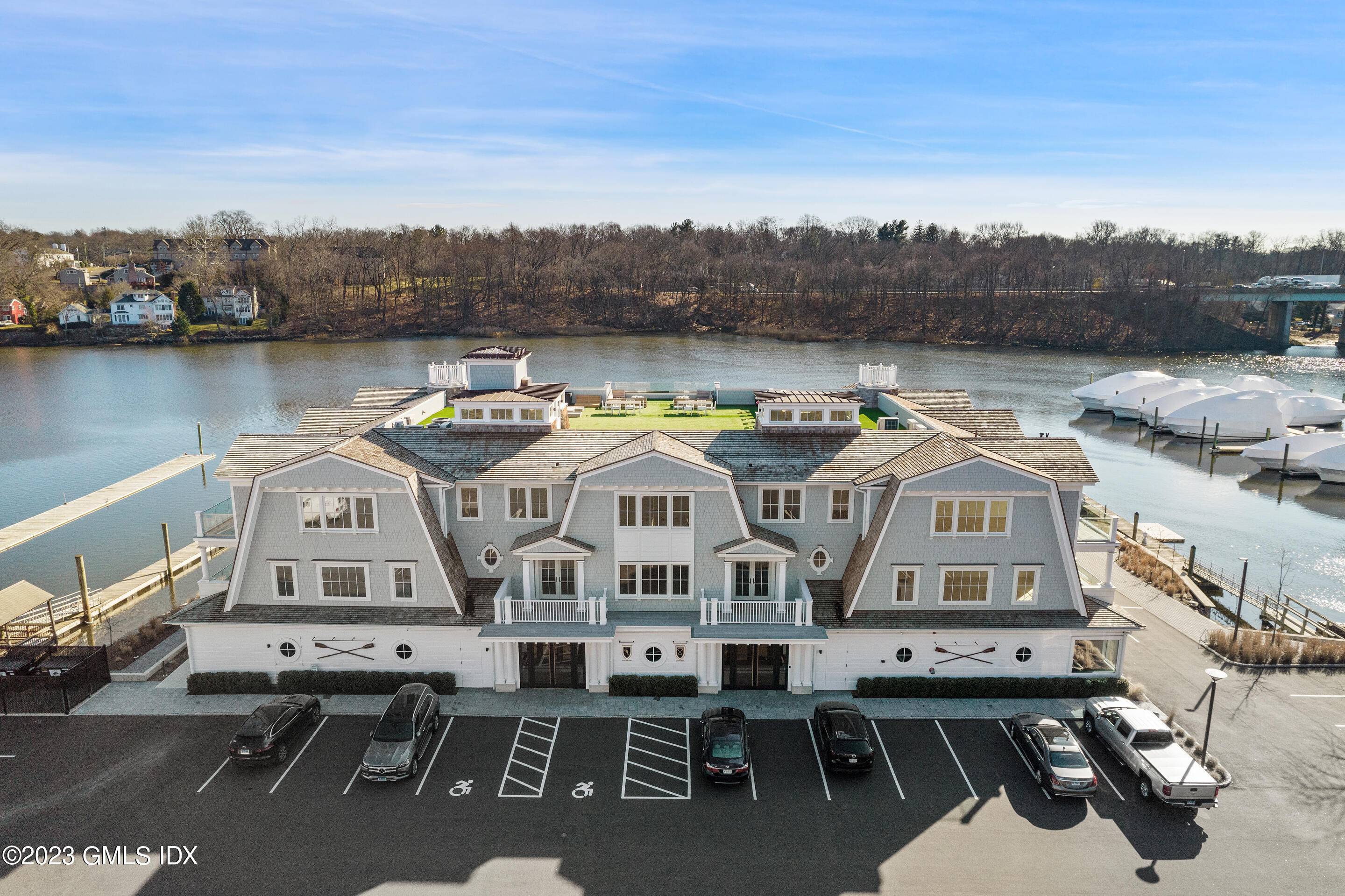 Welcome to the Residences at Greenwich Rowing Club, a modern luxury condo development overlooking Cos Cob Harbor.