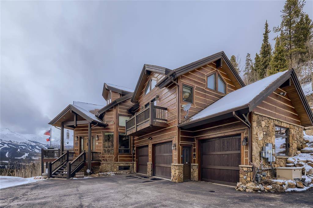 This custom home is perfectly positioned for panoramic views of Breckenridge Ski Resort on 3.
