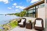 View of patio / terrace featuring a water view