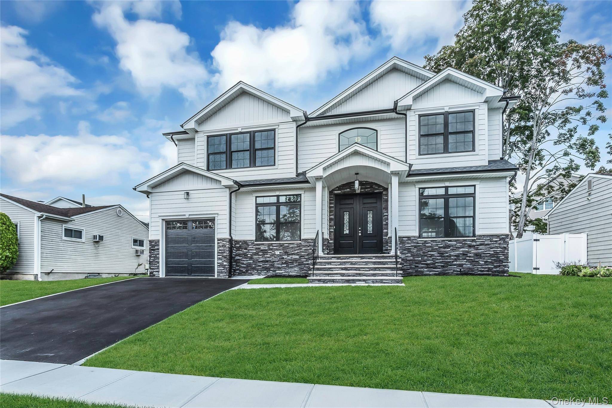 Under Construction ! Stunning Center Hall Colonial Ideally Located Within The Syosset School District.