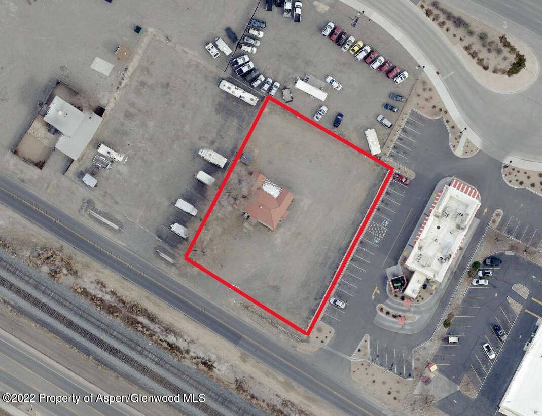Commercial parcel nestled between high traffic Hwy 6 50 and Riverside Parkway.