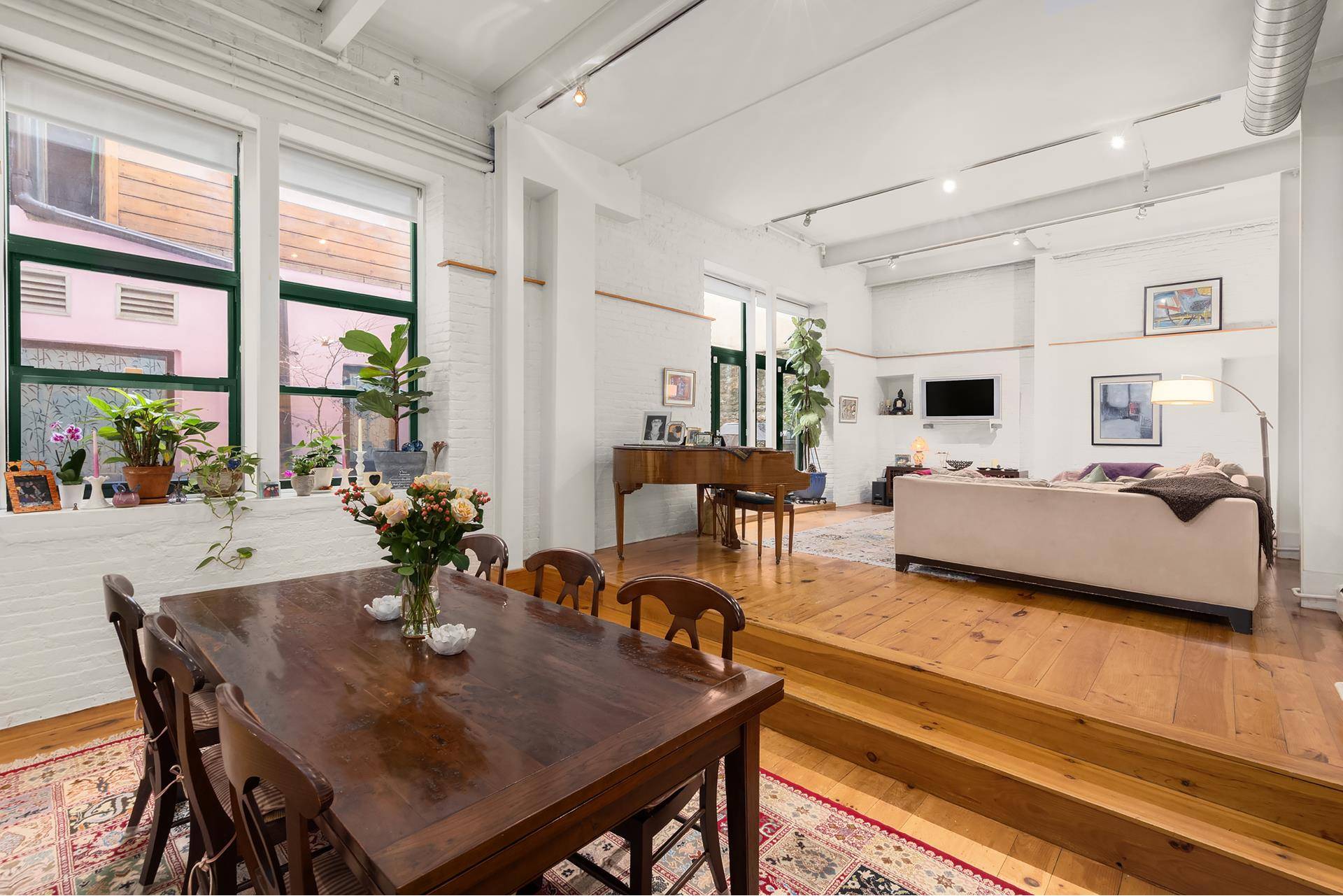Magnificent four bedroom and three bath with private garden, laundry and central air in the heart of the East Village.