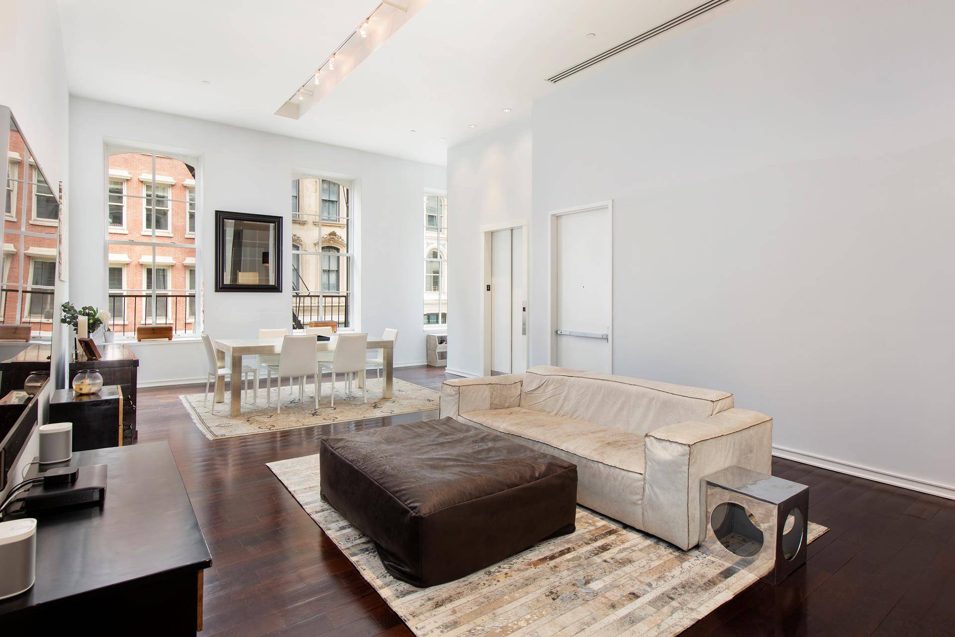 Don't Miss this Stunning, Full Floor Loft Condo with 2 Beds, 2 Baths, a Den and 14' Ceilings in the heart of Tribeca !