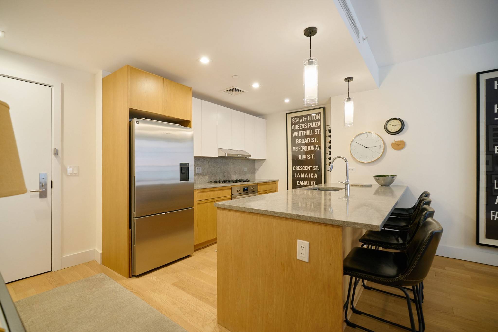 FEATURES Open Kitchen with Gray Caesarstone Countertops amp ; Island Premium Appliances by Bertazzonni, Fisher Paykel, amp ; Bosch Secondary Bedroom features Custom Wall Sofa Bed by Resource Furniture Blackout ...