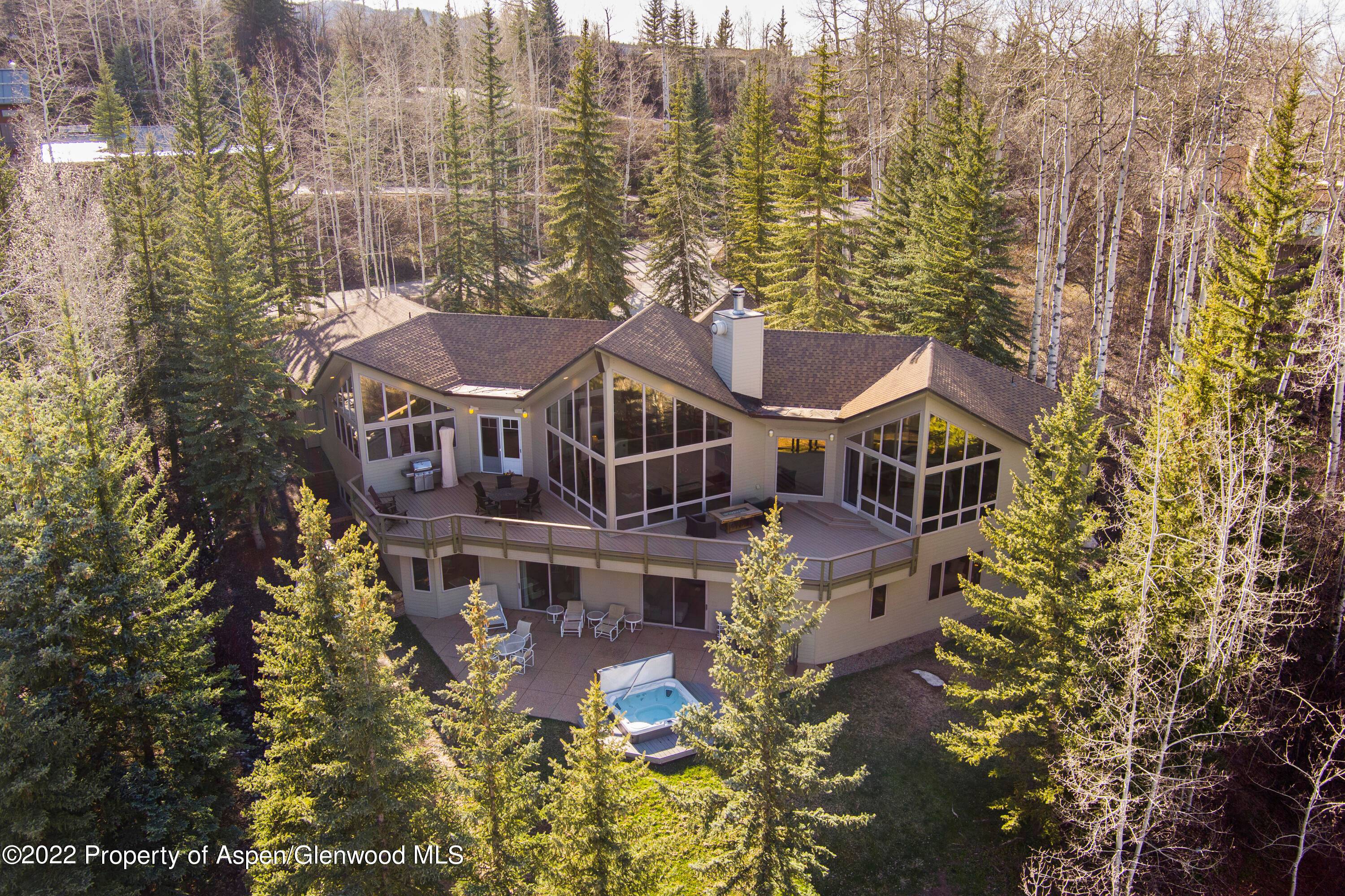 Rare view home perched on nearly an acre above Snowmass Village on the desirable East side of the Ridge Run neighborhood.