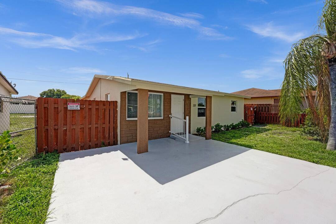Located blocks away from downtown in the exciting city of Delray Beach, this renovated home has 4 bedrooms 2 baths a den that can be used as a home office.
