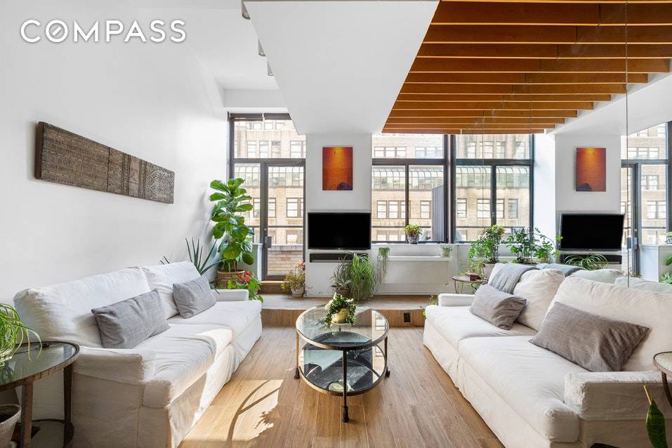 Come home to a sun flooded, mint condition loft on a high floor with private terrace.