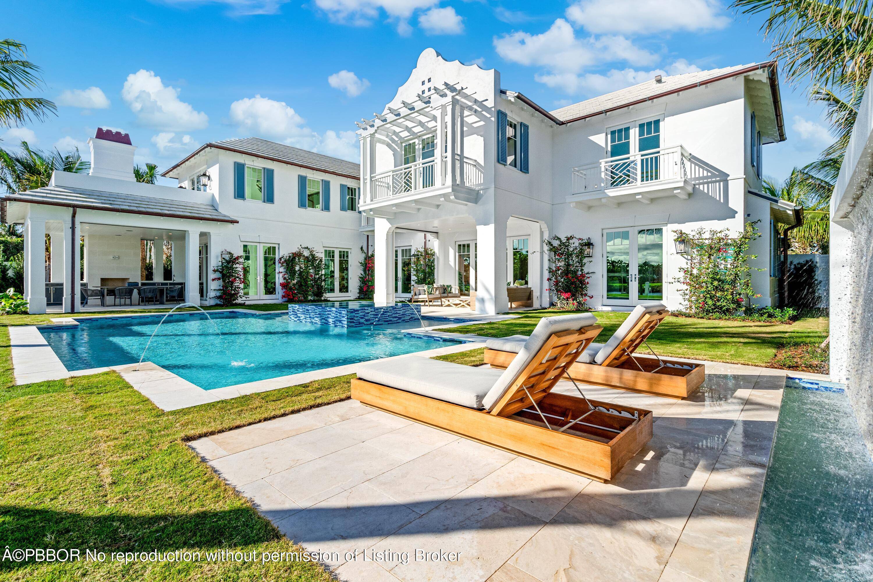 Welcome to 584 Island Drive, the premier new construction home on Everglades Island in Palm Beach.