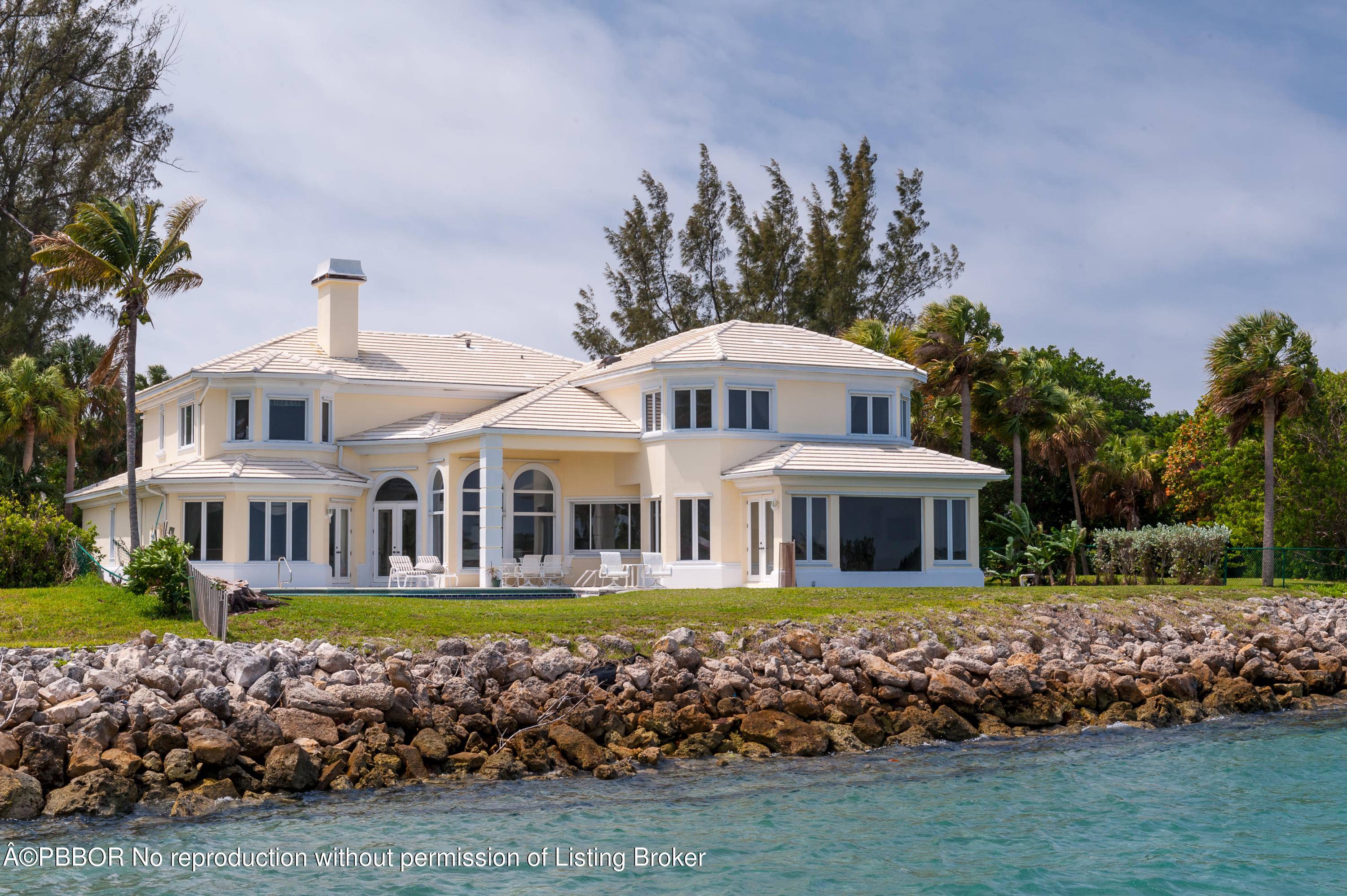 Waterfront, traditional, two story home with 6 bedrooms and 6.