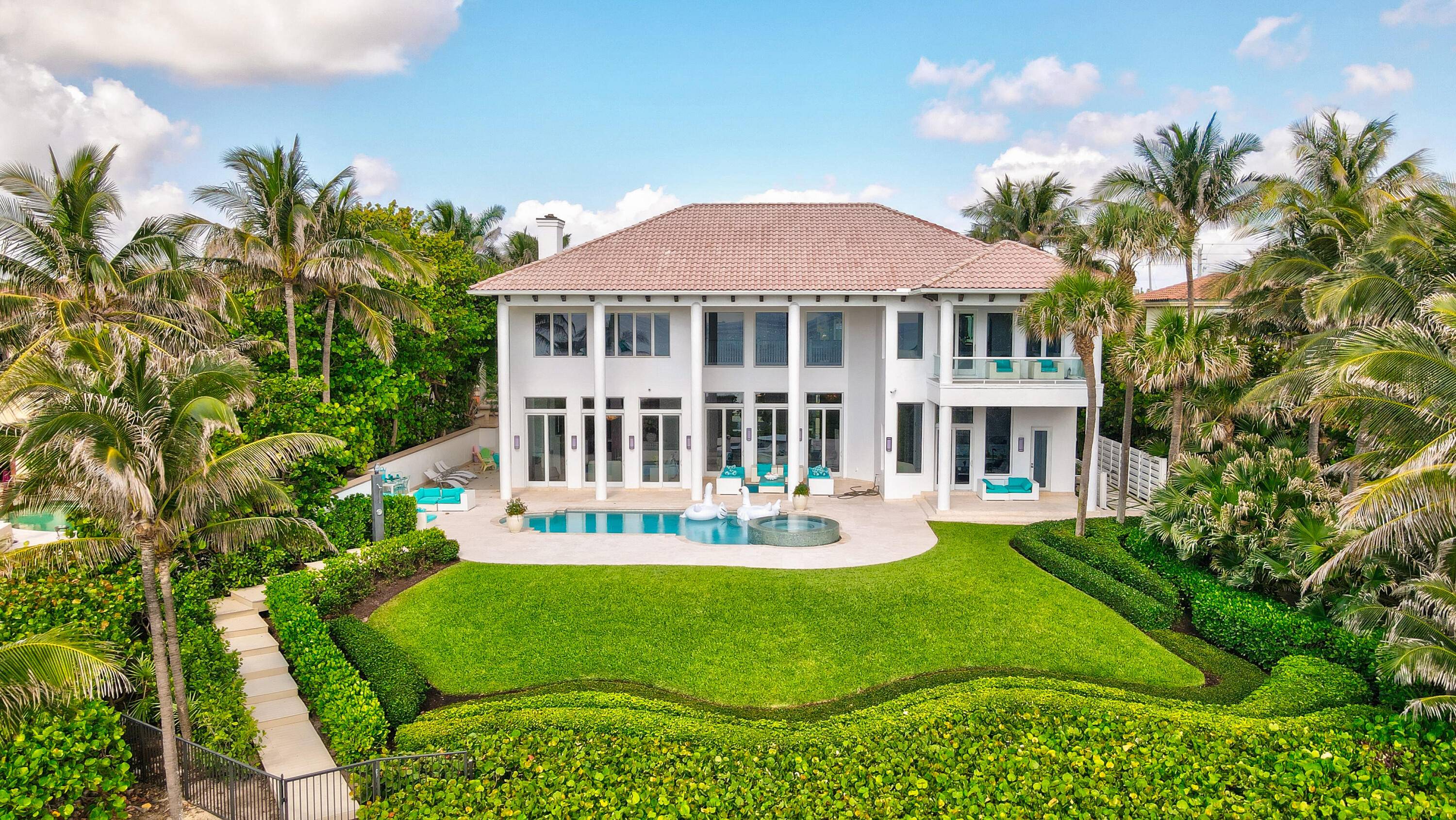 Unique oceanfront masterpiece in the highly sought after private estate section of Delray Beach.