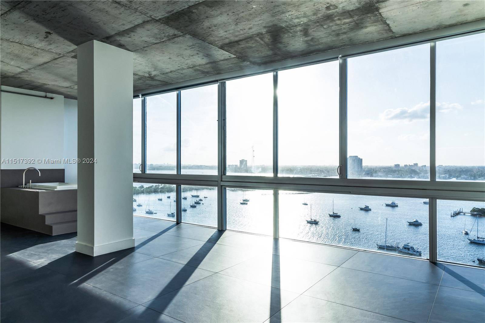 Step into this luxury corner unit at Space 01 by renowned architect Chad Oppenheim.